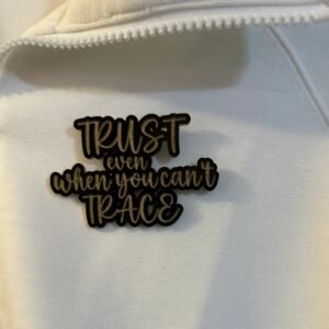 "Trust Even When You Can't Trace" (wearable pin)